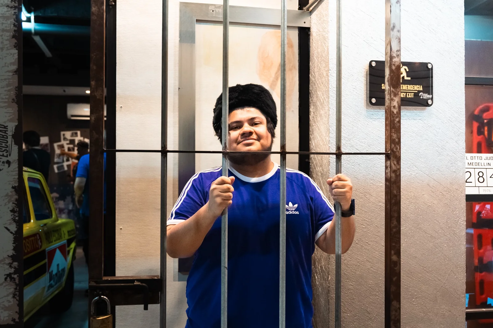 Visitor at a historical museum exhibit during the Pablo Escobar tour