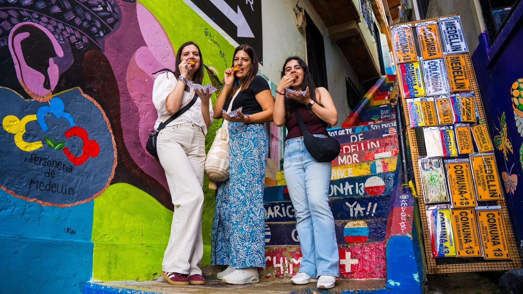Travelers enjoying a local food stop with Culture Colombia Tours
