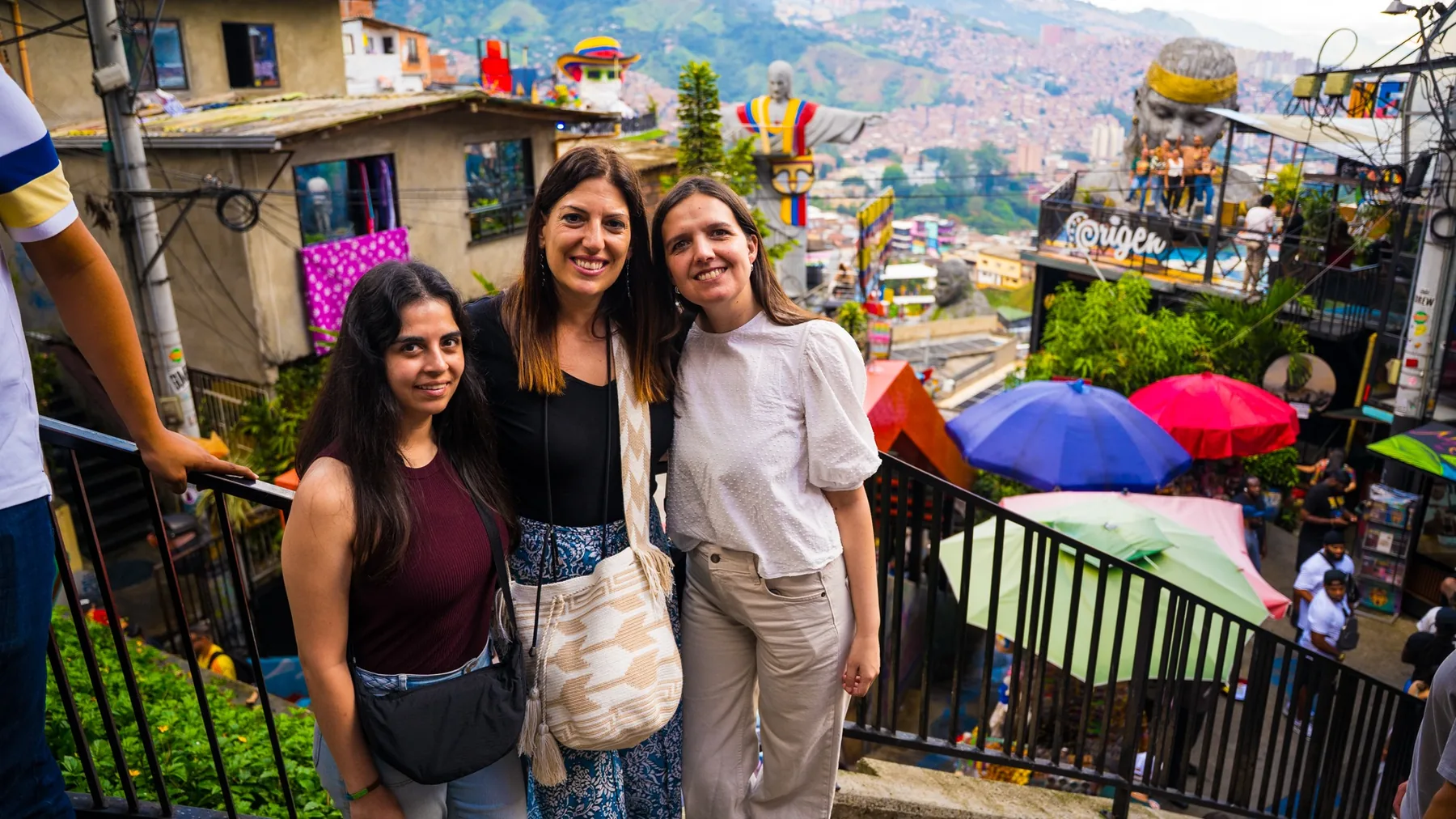 Travelers overlooking Medellín during a locally guided experience